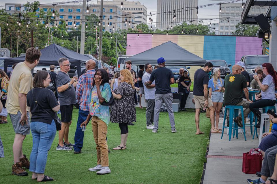 Last Saturday, well over 100 people gathered at South Station in Downtown Tallahassee to help raise money for the businesses in Railroad Square that were hit hardest by the recent Tallahassee tornadoes.