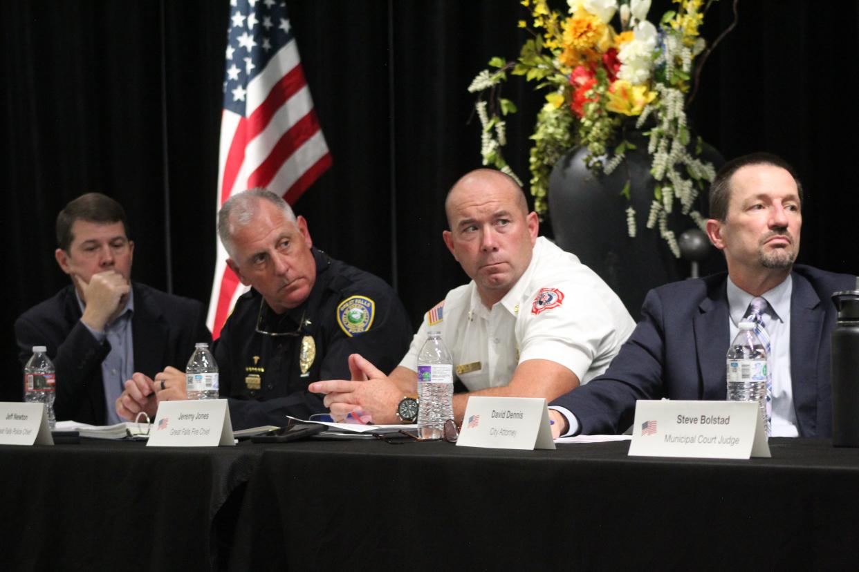 Great Falls city officials listen intently as local juvenile crime and addiction specialists speak about the rise of violence and addiction among young people in Great Falls. From left to rignt are City Manager Greg Doyon, Police Chief Jeff Newton, Fire Chief Jeremy Jones and City Attorney David Dennis.