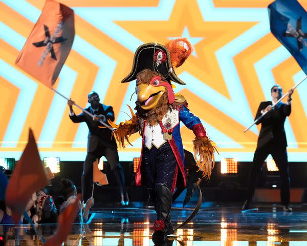 <p>Trae Patton / FOX</p> Royal Hen performing on 'The Masked Singer.'