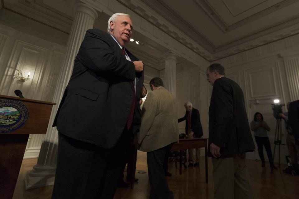 <p>Governor Jim Justice stands up to leave a press conference at the capitol building on the fourth day of statewide walkouts in Charleston, W.Va., on Tuesday, February 27, 2018. (Photo: Craig Hudson/Charleston Gazette-Mail via AP) </p>