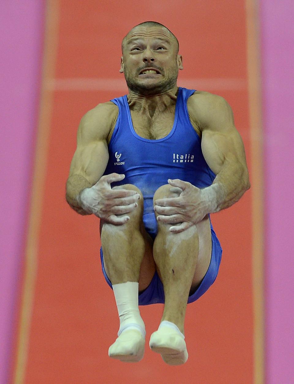 Italy's Matteo Angioletti vaults during the London 2012 Olympic Games Artistic Gymnastics qualification, London, Britain, 28 July 2012. EPA/ANDREW GOMBERT