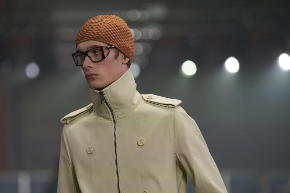 A model wears a creation part of the men's Prada Fall-Winter 2024-2025 collection, that was presented in Milan, Italy, Sunday, Jan. 14, 2024. (AP Photo/Luca Bruno).