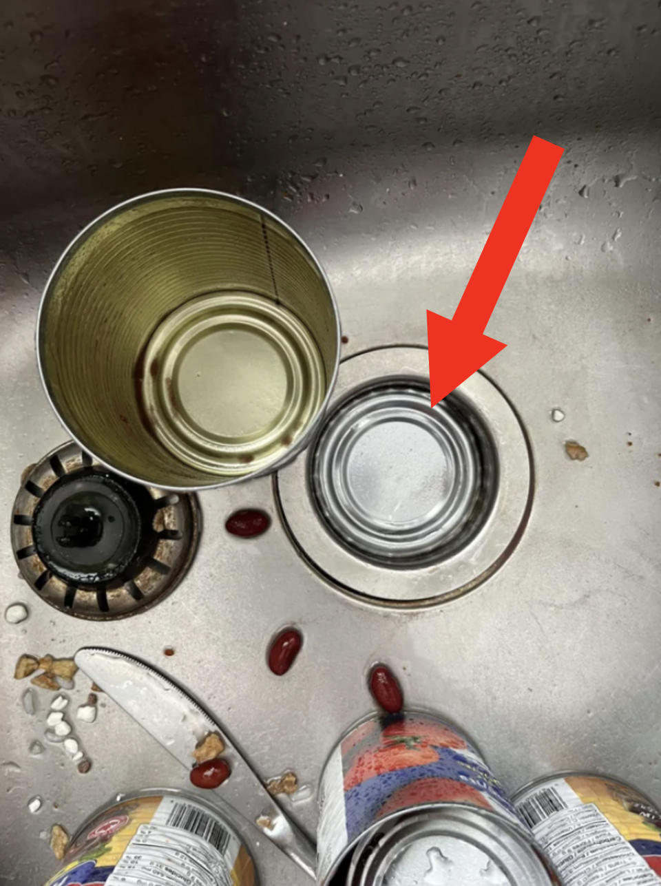 tin top blocking the sink drain