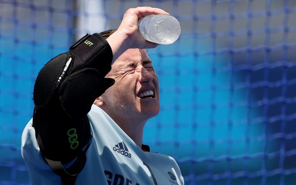 Maddie Hinch tries to cool down and Oi Hockey Stadium  - GETTY IMAGES