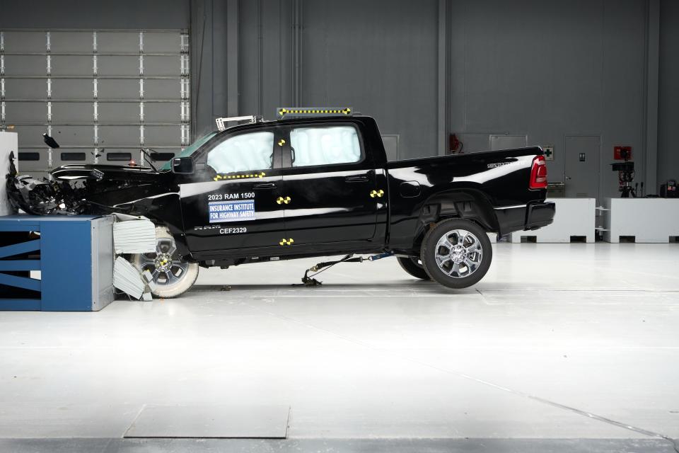 The 2023 Ram 1500 crew cab, shown here during a crash test, earned a "poor" for front crash safety from the Insurance Institute for Highway safety because of the risk to its rear passengers for head, neck and chest injury as well as problems with seatbelt restraint.