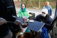 Residents receive free food from Food for Life Foundation in Budapest