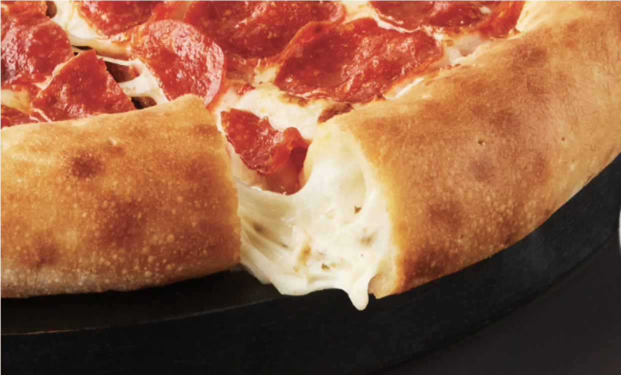 Cheesy Calzone Epic Stuffed Crust made with fresh, never-frozen dough is a blend of mozzarella and garlic herb ricotta. (COURTESY: Papa John's) 