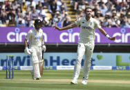 England's Stuart Broad, right, reacts after bowling a delivery during the second day of the second cricket test match between England and New Zealand at Edgbaston in Birmingham, England, Friday, June 11, 2021. (AP Photo/Rui Vieira)