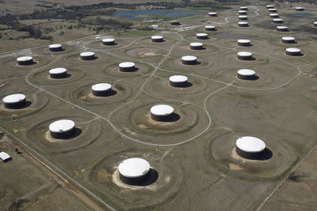 Crude oil storage tanks are seen from above at the Cushing oil hub, in Cushing, Oklahoma, March 24, 2016. REUTERS/Nick Oxford/Files