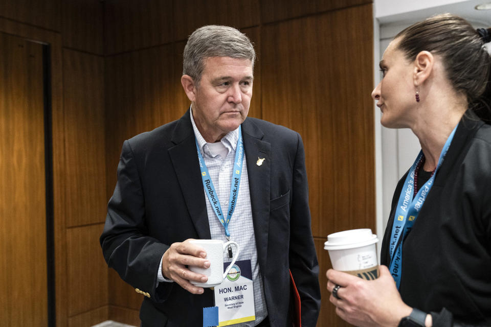 Mac Warner, Cait Conley (Jacquelyn Martin / AP file)