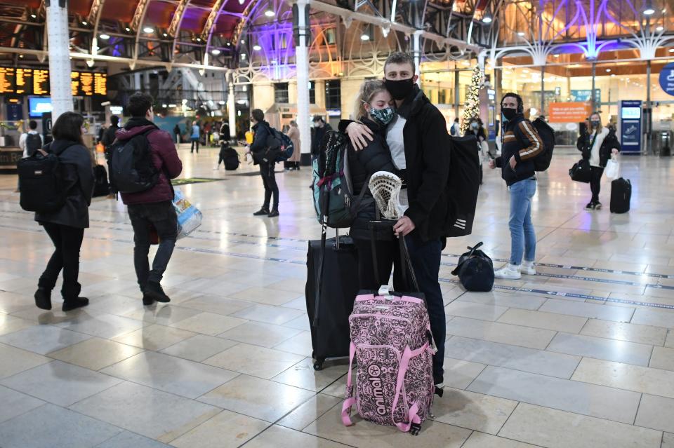 <p>People wait on the concourse at Paddington Station after the announcement that London was moving into Tier 4</p>PA