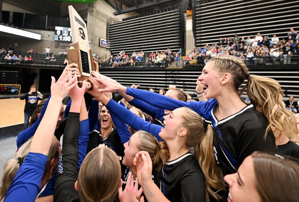 Panguitch players celebrate their win over Rich for the 1A Volleyball championship at UVU on Saturday, Oct. 28, 2023.