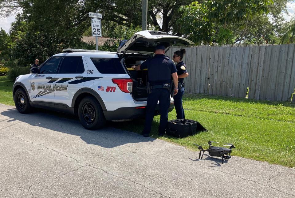 Port St. Lucie police unload a drone at Southeast Caliph Street and Southeast Melaleuca Boulevard about 3:15 p.m. Friday, May 19, 2023, in an effort to search for Ana Delacruz, 93. She has what was described by police as late-stage Alzheimer’s disease.