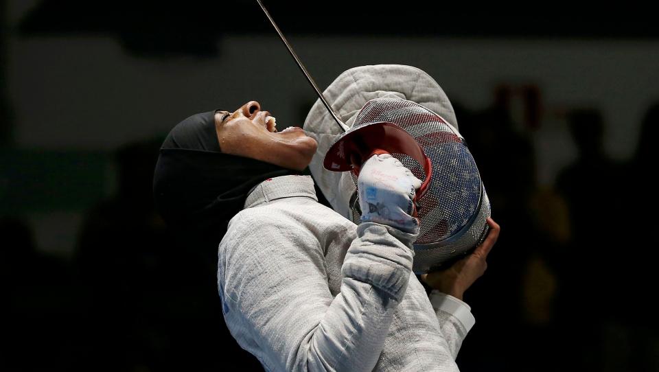 Ibtihaj Muhammad celebrating after she won the women's sabre team semifinals in the 2016 Olympics in Rio de Janeiro.&nbsp; (Photo: Issei Kato / Reuters)