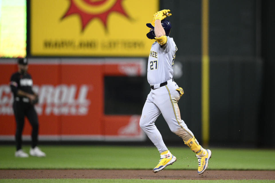 Milwaukee Brewers' Willy Adames celebrates his three-run home run against the Baltimore Orioles during the fifth inning of a baseball game Friday, April 12, 2024, in Baltimore. (AP Photo/Nick Wass)