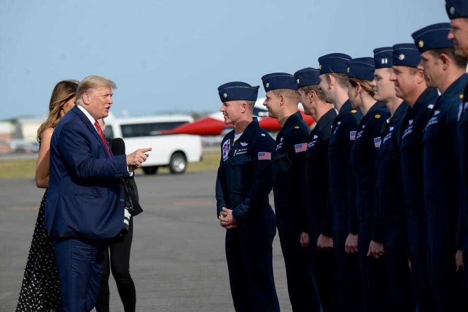 Donald Trump and the first lady meet members of the Thunderbirds, the air demonstration squadron of the US Air Force, after the Nascar Daytona 500 in Florida: REUTERS