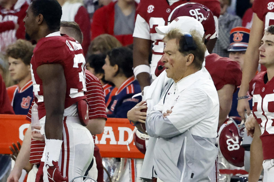 Alabama head coach Nick Saban sports a facial injury after being bumped during the first half of an NCAA college football game against Auburn, Saturday, Nov. 26, 2022, in Tuscaloosa, Ala. (AP Photo/Butch Dill)