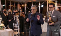 In this video grab captured on Sept. 20, 2020, courtesy of the Academy of Television Arts & Sciences and ABC Entertainment, Annie Murphy, from left, Catherine O'Hara, Noah Reid, Sarah Levy, Karen Robinson, Eugene Levy and Daniel Levy accept the award for outstanding comedy series for "Schitt's Creek" during the 72nd Emmy Awards broadcast. (The Television Academy and ABC Entertainment via AP)