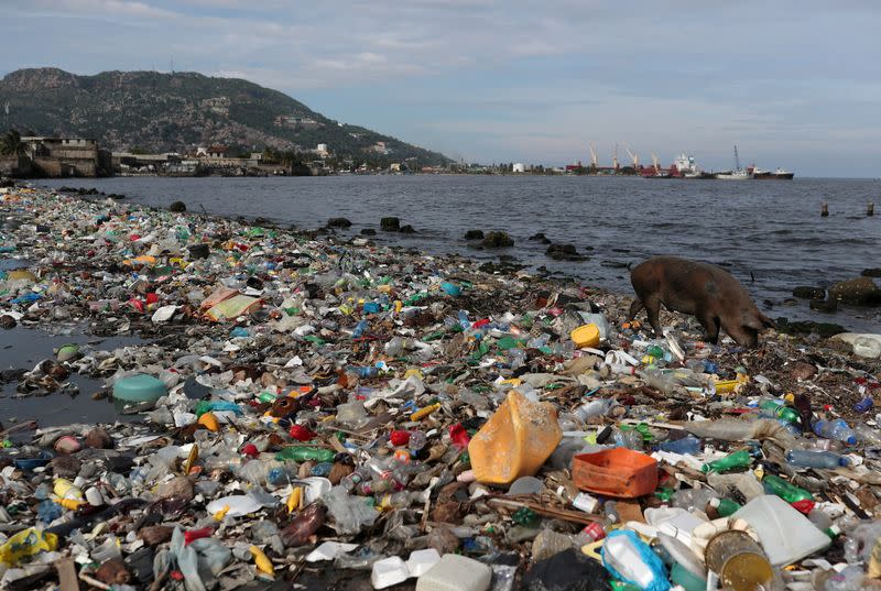 FILE PHOTO: Plastic and other debris are seen on the shores of Cap Haitian beach, in Cap Haitian