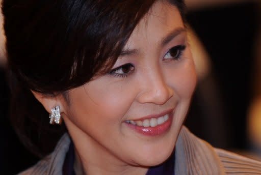 Thai Prime Minister Yingluck Shinawatra visits Bangkok's Foreign Correspondents Club in March 2012. Thailand says it is boosting security ahead of an incendiary charter amendment case that could lead to the dissolution of the ruling party, with judges given special police protection