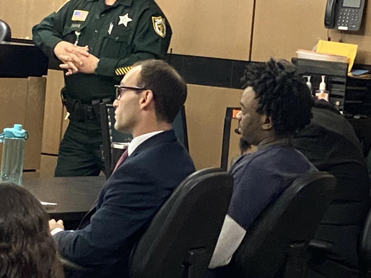 Anthony Jamal Williams, center, listens during sentencing remarks on April 3, 2023. Williams was sentenced to life in prison in the January 2012 shooting death of Jake Duchene