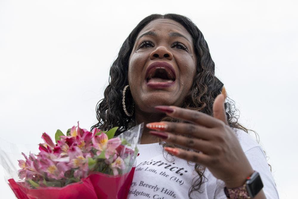 Rep. Cori Bush, D-Mo., cries after it was announced that the Biden administration will enact a targeted nationwide eviction moratorium outside of Capitol Hill in Washington on Tuesday, August 3, 2021. (AP Photo/Amanda Andrade-Rhoades)