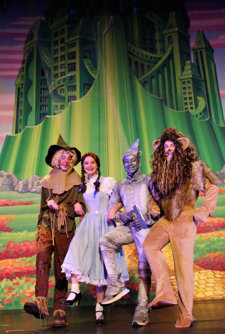 They were off to see the wizard before the Paramount Theatre's junior production was shut down due to a pandemic surge - from left, the Scarecrow (Brody Parris), Dorothy Gale (Julien Little), Tin Man (Micah Mallet) and Cowardly Lion (Jonah Holmes) get in step to travel the Yellow Brick Road, not to see an Elton John concert, but to the Emerald City to be given what each needs. =