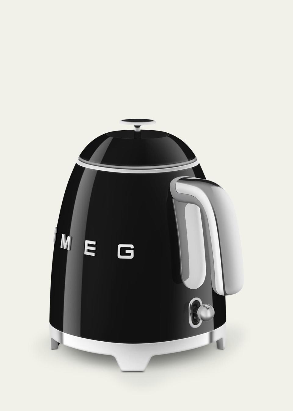 <p><a href="https://go.redirectingat.com?id=74968X1596630&url=https%3A%2F%2Fwww.bergdorfgoodman.com%2Fp%2Fsmeg-mini-kettle-prod166980150&sref=https%3A%2F%2Fwww.harpersbazaar.com%2Fbeauty%2Fhealth%2Fg45271308%2Fbest-wellness-gifts%2F" rel="nofollow noopener" target="_blank" data-ylk="slk:Shop Now;elm:context_link;itc:0;sec:content-canvas" class="link ">Shop Now</a></p><p>Mini Kettle</p><p>bergdorfgoodman.com</p><p>$150.00</p><span class="copyright">Bergdorf Goodman</span>