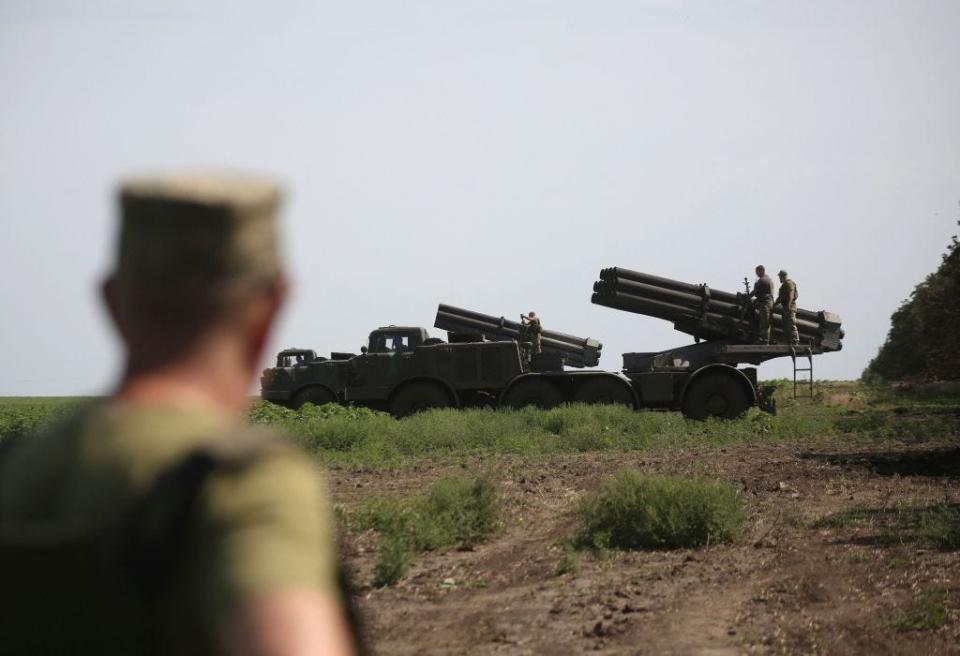 Ukrainian gunners prepare to fire with a BM-27 Uragan, a self-propelled 220 mm multiple rocket launcher, at a position near a frontline in Donetsk region on August 27, 2022, amid the Russian invasion of Ukraine.
