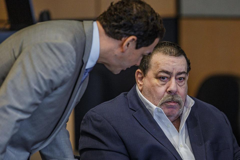 Defense attorney Scott Skier, left, talks with Richard Lange before voir dire in the murder and sexual battery case against Lange in Judge Daliah Weiss's courtroom at the Palm Beach County Courthouse in West Palm Beach, Fla., on January 30, 2023. Lange is charged with the sexual assault and murder of 78-year-old Mildred Matheny in 1985.