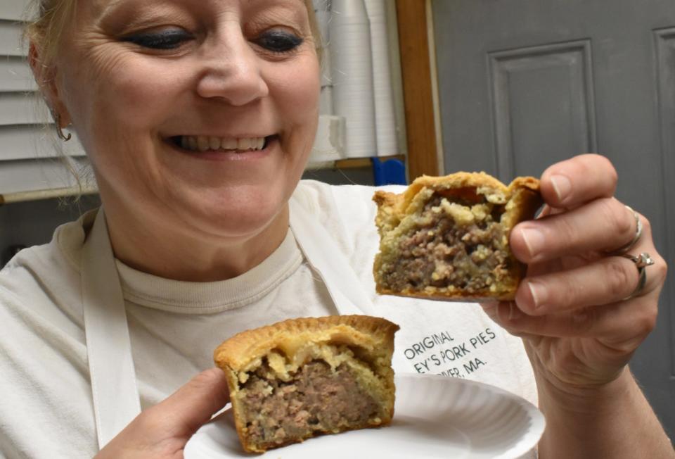 Hartley's Original Pork Pie owner Amy Johnson shows a pork pie at the Fall River landmark.