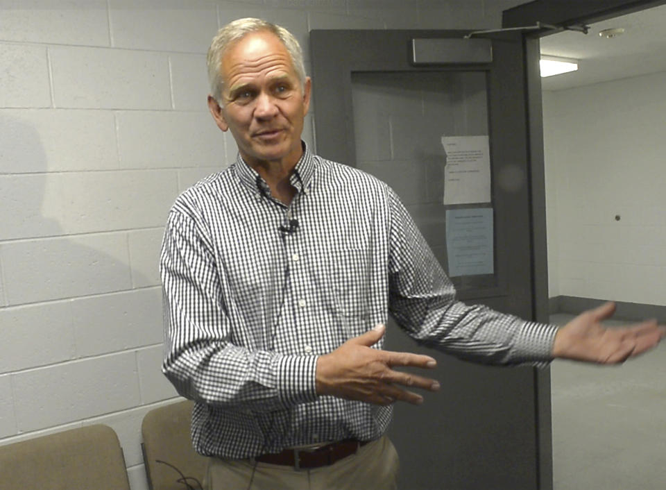 FILE - In this June 12, 2018, file photo, Ed Smart talks to the media at the Utah State Prison in Draper, Utah, after a parole hearing for Wanda Barzee. The father of Utah kidnapping survivor Elizabeth Smart has come out as gay, saying his decision brings challenges but also "huge relief." Ed Smart said in a letter explaining his decision shared Friday, Aug. 16, 2019, with NBC's "Today" show that he no longer feels comfortable being a member of The Church of Jesus Christ of Latter-day Saints, which opposes same-sex relationships. (Rick Egan/The Salt Lake Tribune via AP, File)