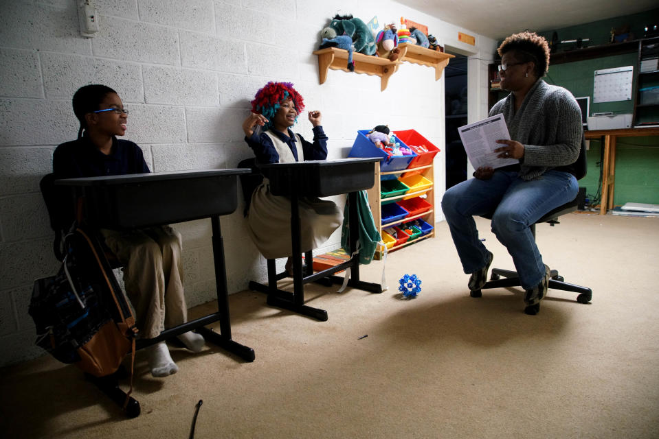 DeShanna home schools Trinity and Lucien in the family's basement.