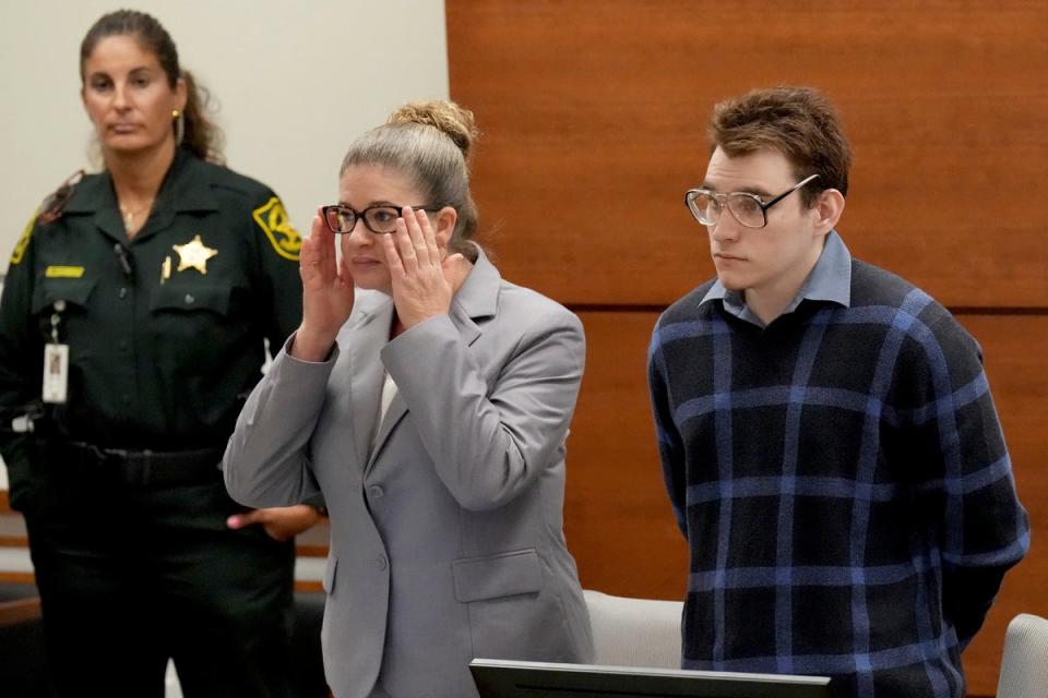 Nikolas Cruz stands as jurors enter the courtroom on 29 August (AP)