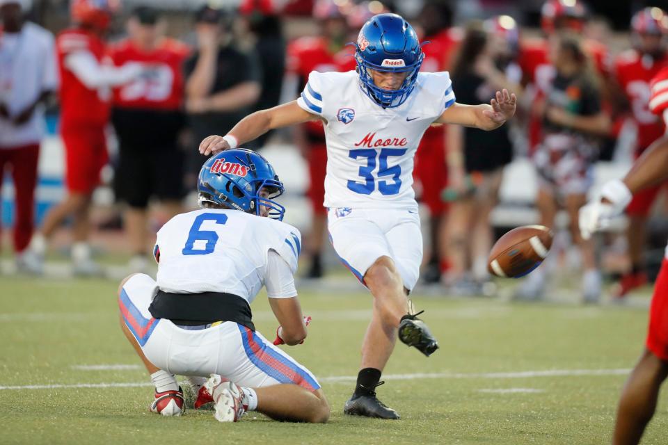 Moore's Liam Evans kicks a field goal during a high school football game between Moore and Westmoore at in Moore, Okla., Friday, Sept. 22, 2023