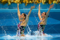 Nayara Figueira and Lara Teixeira of Brazil compete in the Women's Duets Synchronised Swimming Technical Routine on Day 9 of the London 2012 Olympic Games at the Aquatics Centre on August 5, 2012 in London, England. (Photo by Al Bello/Getty Images)