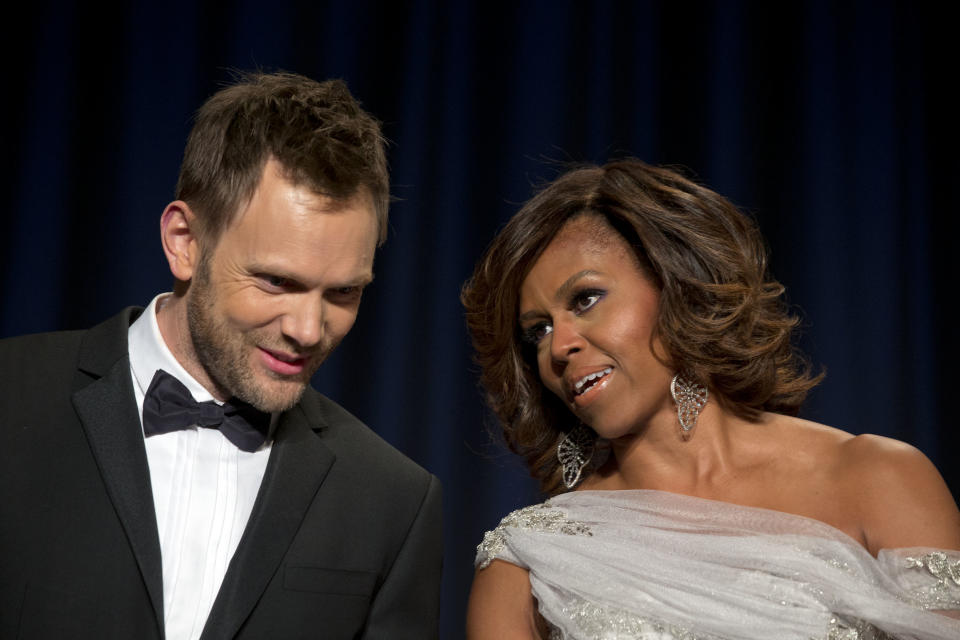 Actor and comedian Joel McHale, star of the NBC series Community, speaks with first lady Michelle Obama during the White House Correspondents' Association (WHCA) Dinner at the Washington Hilton Hotel, Saturday, May 3, 2014, in Washington. (AP Photo/Jacquelyn Martin)