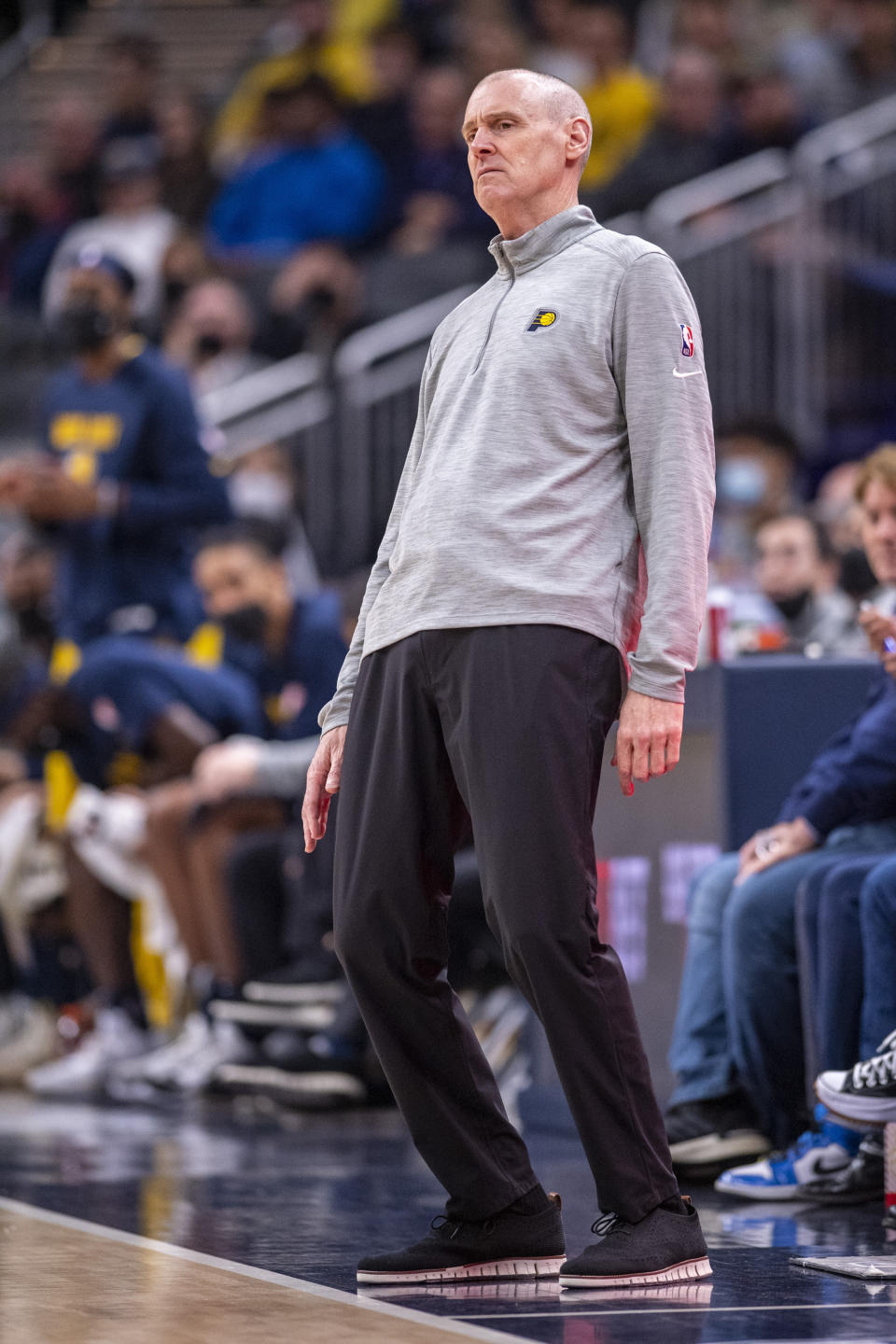 Indiana Pacers head coach Rick Carlisle reacts to the action on the court during the first half of an NBA basketball game against the Milwaukee Bucks in Indianapolis, Sunday, Nov. 28, 2021. (AP Photo/Doug McSchooler)