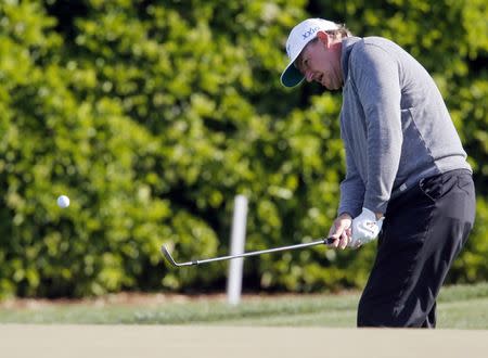 Mar 16, 2018; Orlando, FL, USA; Ernie Els chips onto the 14th green during the second round of the Arnold Palmer Invitational golf tournament at Bay Hill Club & Lodge . Mandatory Credit: Reinhold Matay-USA TODAY Sports