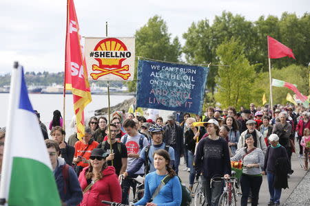 Activists protest the Polar Pioneer at a rally and march in Seattle, Washington, United States April 26, 2015. REUTERS/Jason Redmond