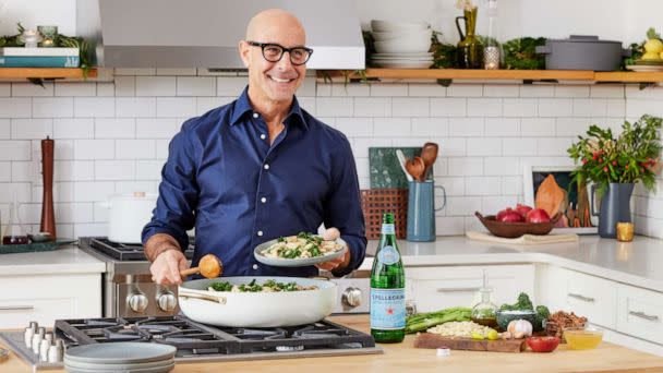PHOTO: Stanley Tucci cooking his new at-home pasta kit with S.Pellegrino. (S.Pellegrino)
