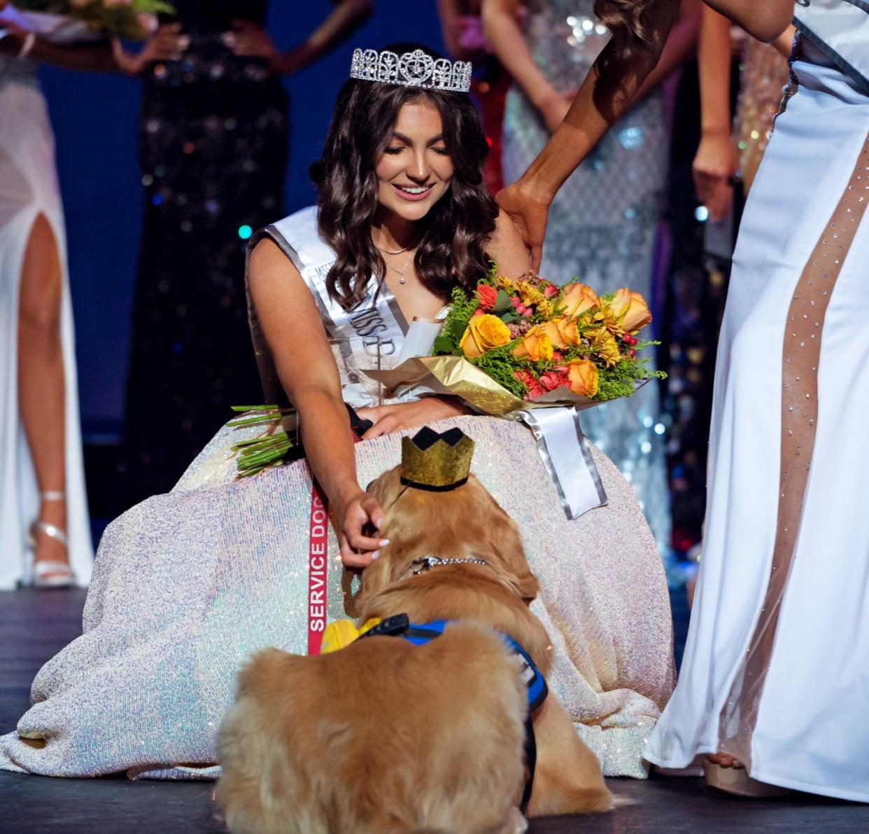 teen crowned winner of pageant with service dog at her side