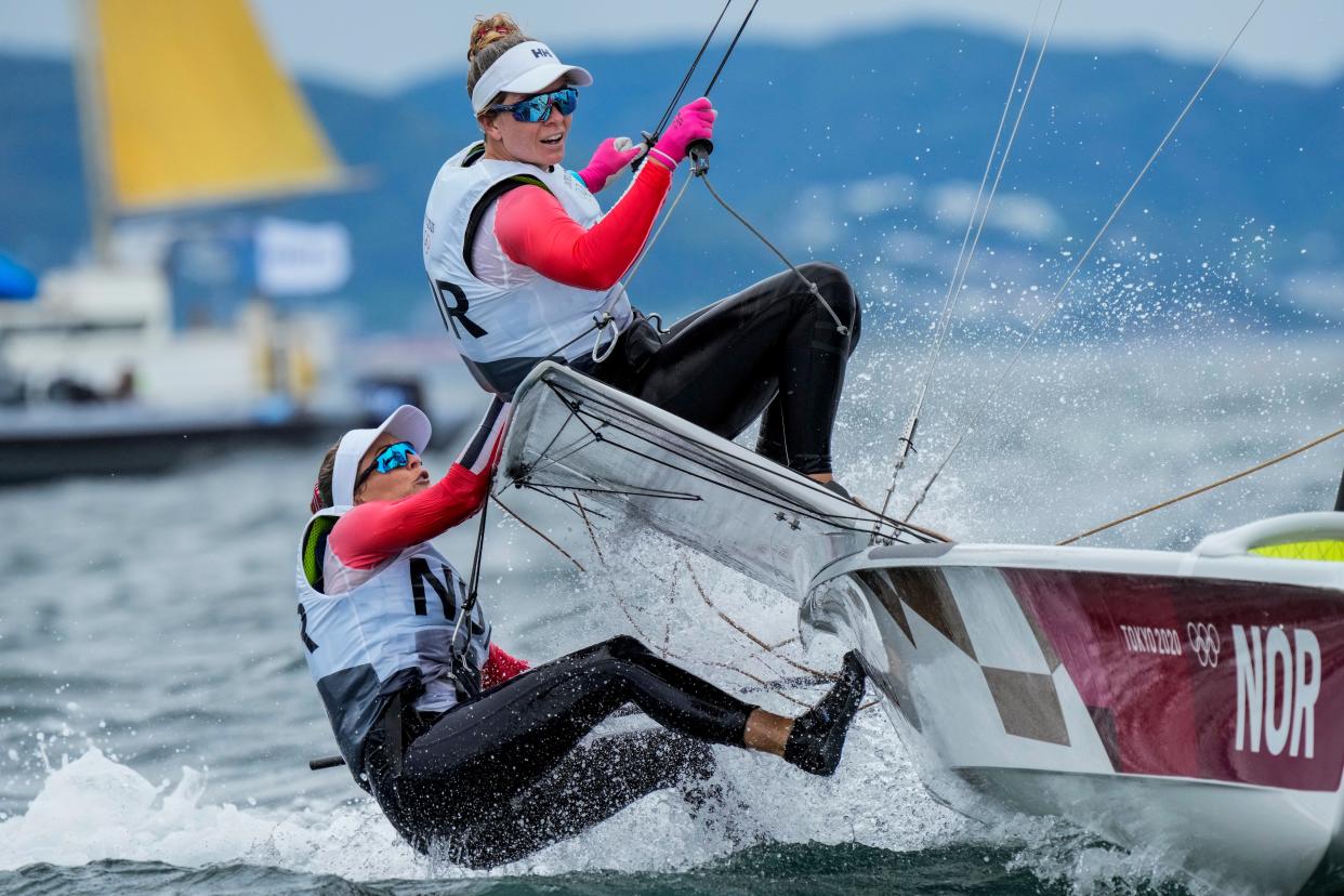 Norway's Helene Naess and Marie Ronningen compete during the 49er FX women race at the Enoshima harbor during the 2020 Summer Olympics, Tuesday, July 27, 2021, in Fujisawa, Japan.