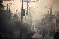 <p>People protest over the cost of fuel in Port-au-Prince, Haiti, Friday, July 6, 2018. (Photo: Dieu Nalio Chery/AP) </p>