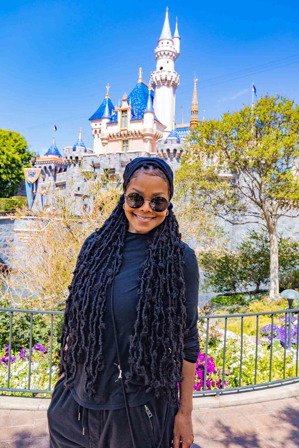 <p>The pop icon stopped by Sleeping Beauty Castle, the centerpiece of Disneyland while visiting the Anaheim theme park with friends and family on March 30.</p>