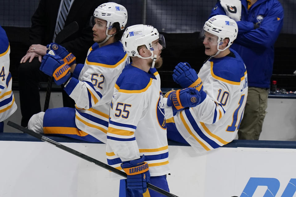 Buffalo Sabres' Rasmus Ristolainen (55) celebrates with teammates after scoring a goal during the third period of the team's NHL hockey game against the New York Islanders on Thursday, March 4, 2021, in Uniondale, N.Y. (AP Photo/Frank Franklin II)