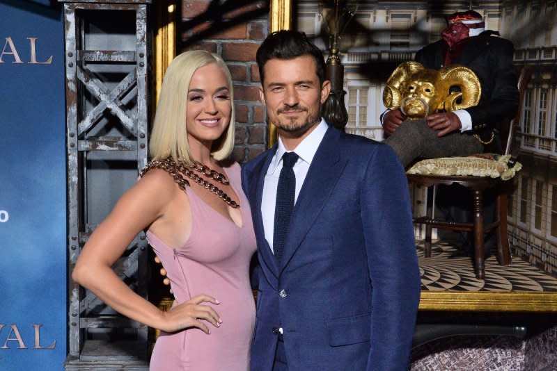 Orlando Bloom (R) and Katy Perry attend the Los Angeles premiere of "Carnival Row" in 2019. File Photo by Jim Ruymen/UPI