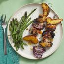 <p>This unexpected combo of pork and peach is juicy and delicious. Just throw these skewers on the grill, and you'll have a flavorful dinner in no time. </p><p><em><a href="https://www.womansday.com/food-recipes/food-drinks/a28354249/pork-and-peach-kebabs-with-grilled-green-beans-recipe/" rel="nofollow noopener" target="_blank" data-ylk="slk:Get the Pork and Peach Kebabs with Grilled Green Beans recipe.;elm:context_link;itc:0;sec:content-canvas" class="link ">Get the Pork and Peach Kebabs with Grilled Green Beans recipe. </a></em></p>