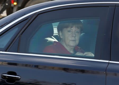 German Chancellor and leader of the Christian Democratic Union (CDU) Angela Merkel sits in her limousine as she arrives to a party's meeting in Berlin, Germany, March 14, 2016. REUTERS/Fabrizio Bensch