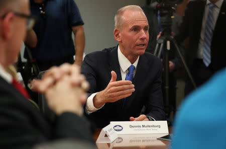 FILE PHOTO: Dennis Muilenburg, CEO, Boeing speaks during a roundtable discussion on defense issues with U.S. President Donald Trump at Luke Air Force Base, Arizona, U.S., October 19, 2018. REUTERS/Jonathan Ernst/File Photo